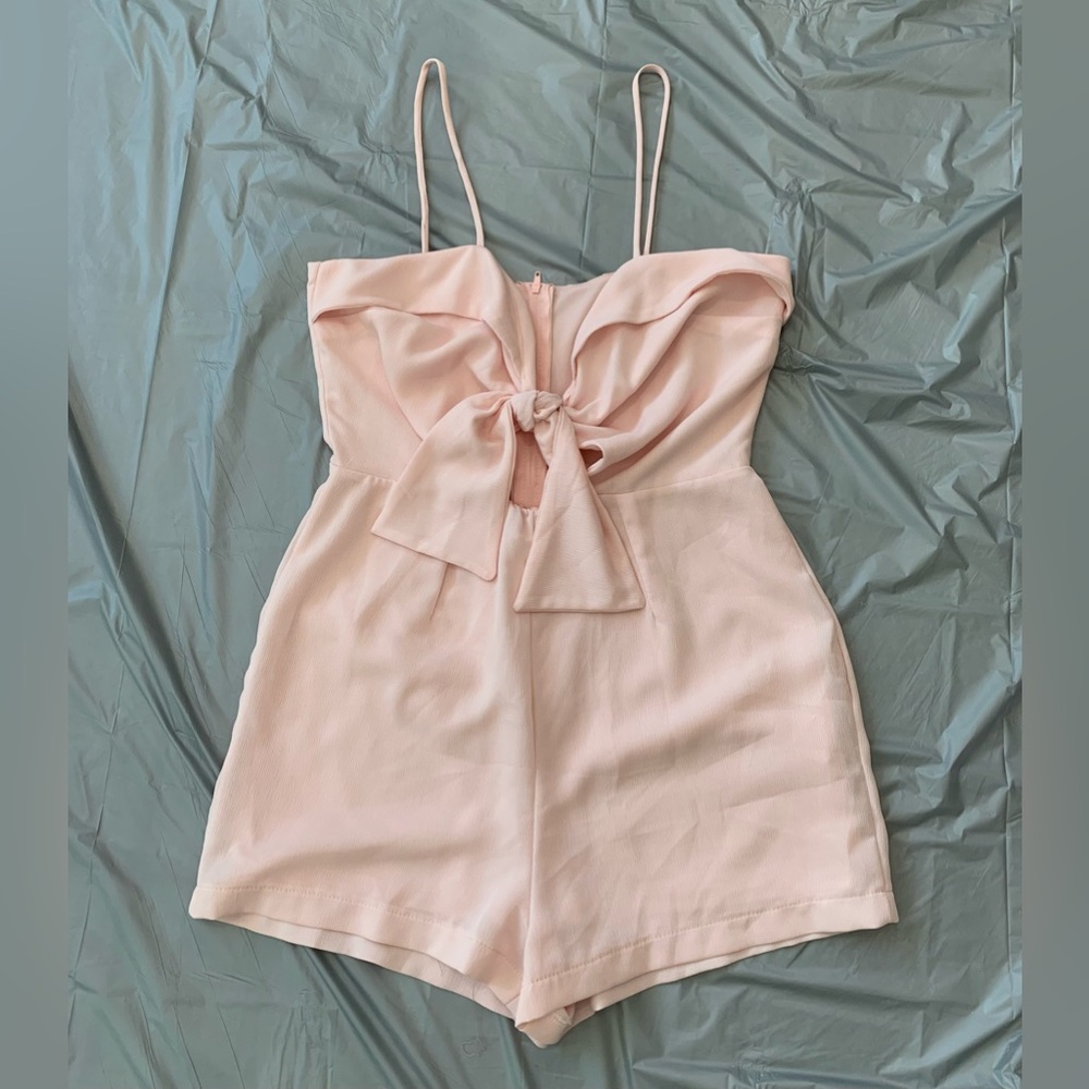Light pink medium romper brand Royalty